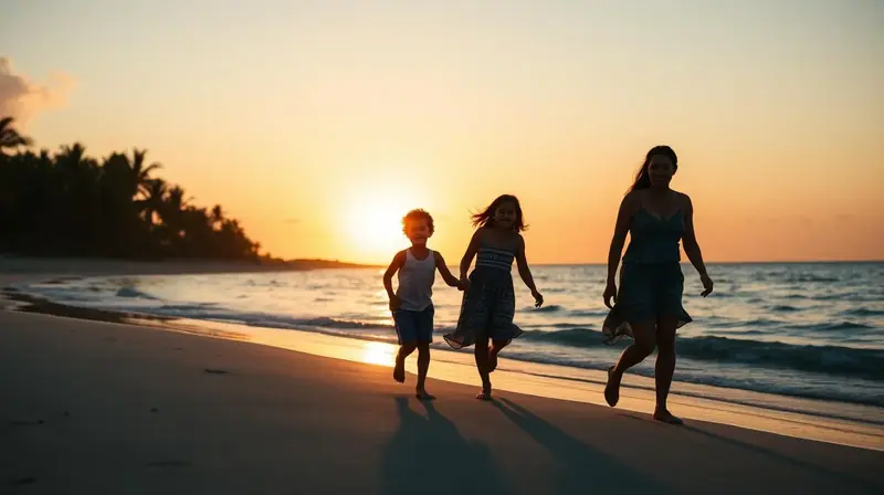 Familie spielt am Strand bei Sonnenuntergang